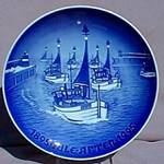 A blue plate with boats on it

Description automatically generated